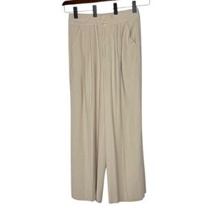 A loved a Chic Tan Wide Leg Jumpsuit for Effortless Elegance size 12 trousers